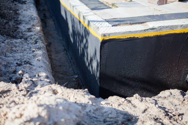 Professional Waterproofing technician working in Bernardsville, NJ